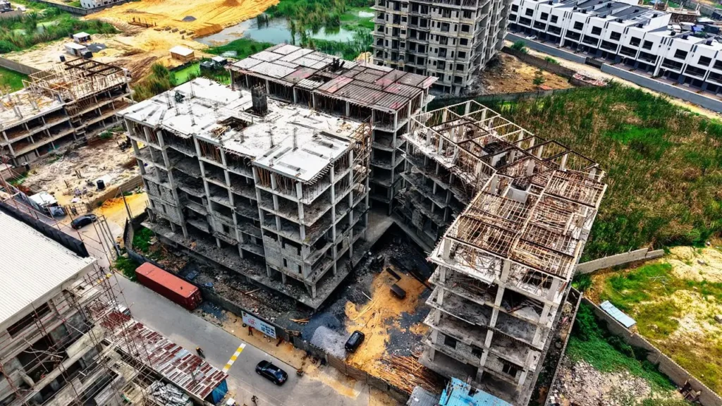 Aerial view of Palazzo Ducale Lekki multi-block luxury apartment complex under construction showing structural frames and site layout in Lekki